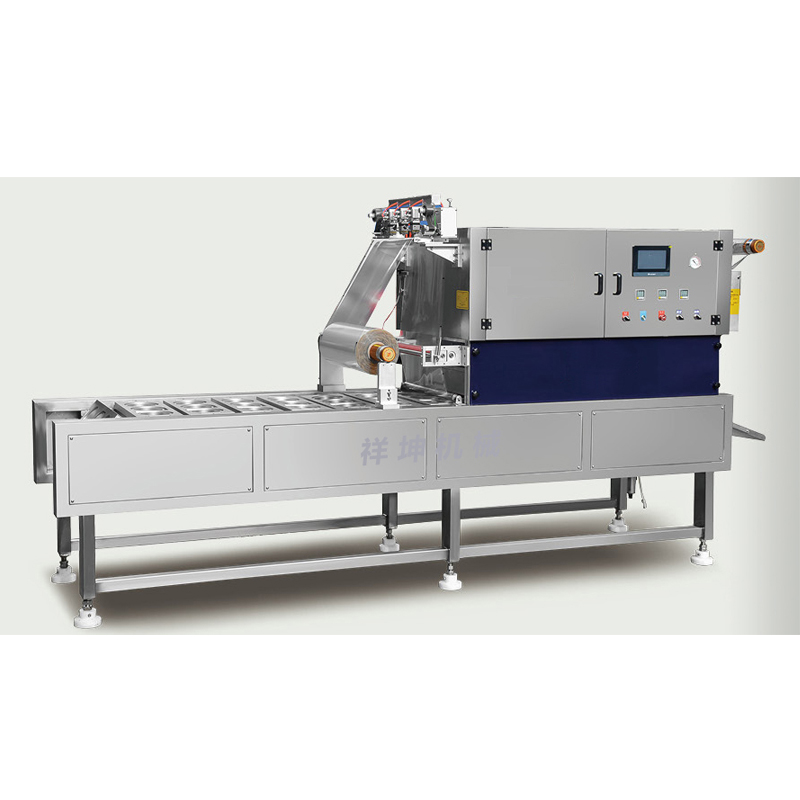 Continuous modified atmosphere packaging machine